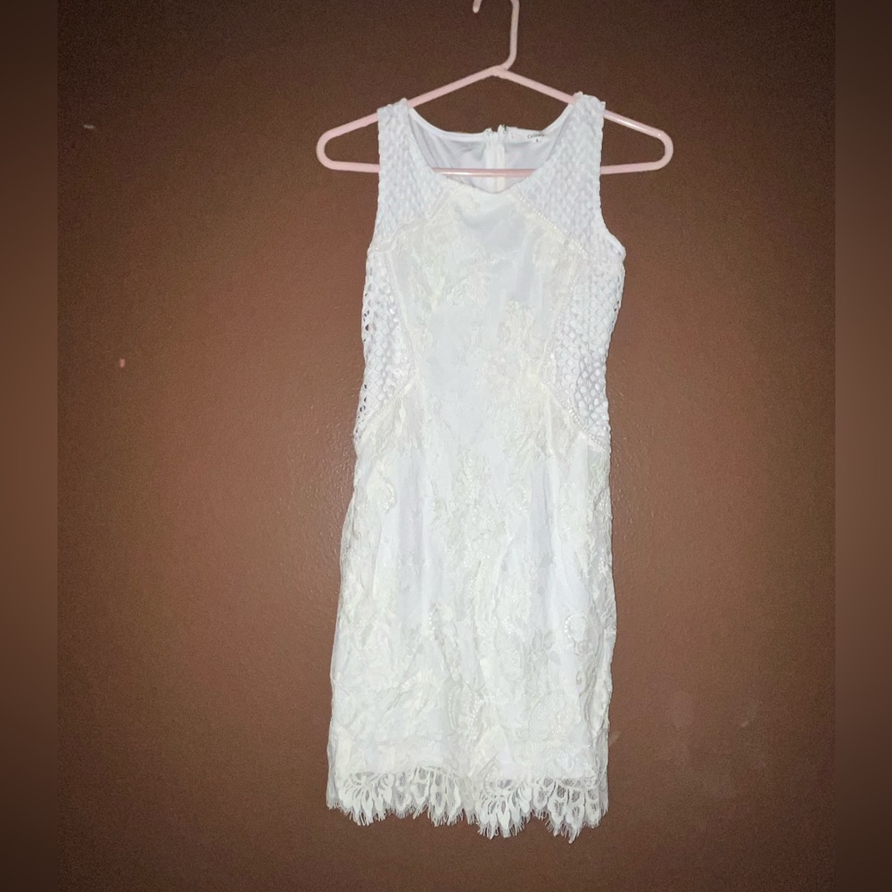 White lace mini dress.
